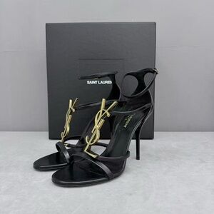 AuthenticSaint Laurent Black and Gold Heels